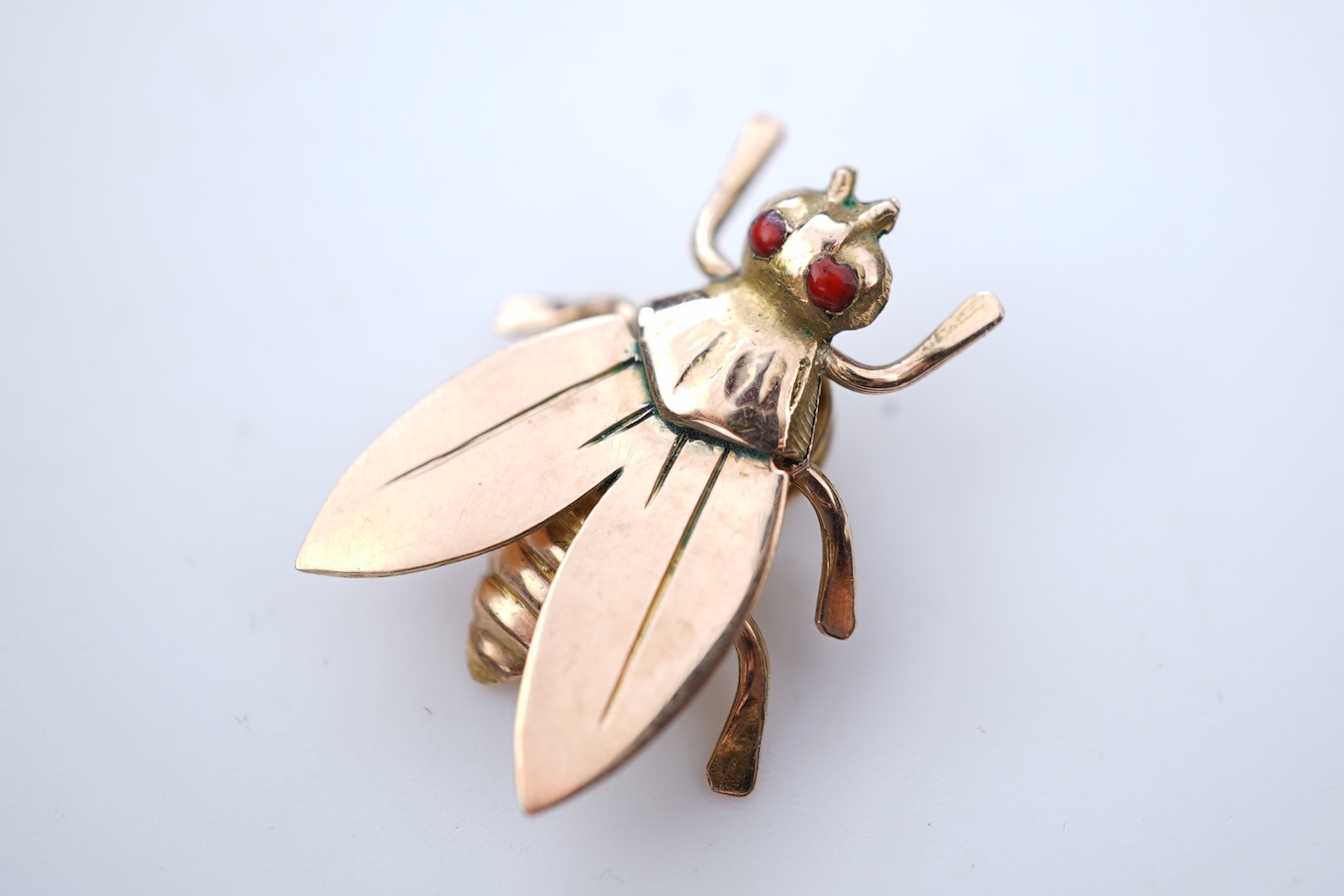 A set of four Retro gold and enamel buttons, mid 20th century